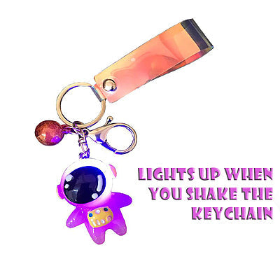 Glowing Astronaut Keychain – 1 Piece | Light-Up Space Rubber Keychain | Blue & White