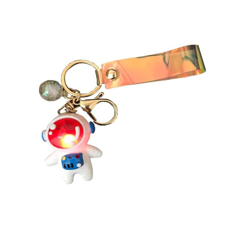 Glowing Astronaut Keychain – 1 Piece | Light-Up Space Rubber Keychain | Blue & White